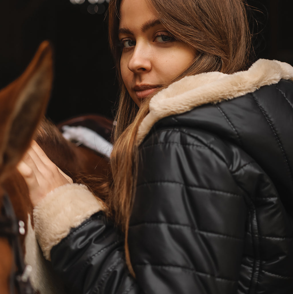 Side view of the Horse Spirit Riding Winter Jacket - Shows the riding-specific silhouette, water-resistant fabric, and luxurious fur details.