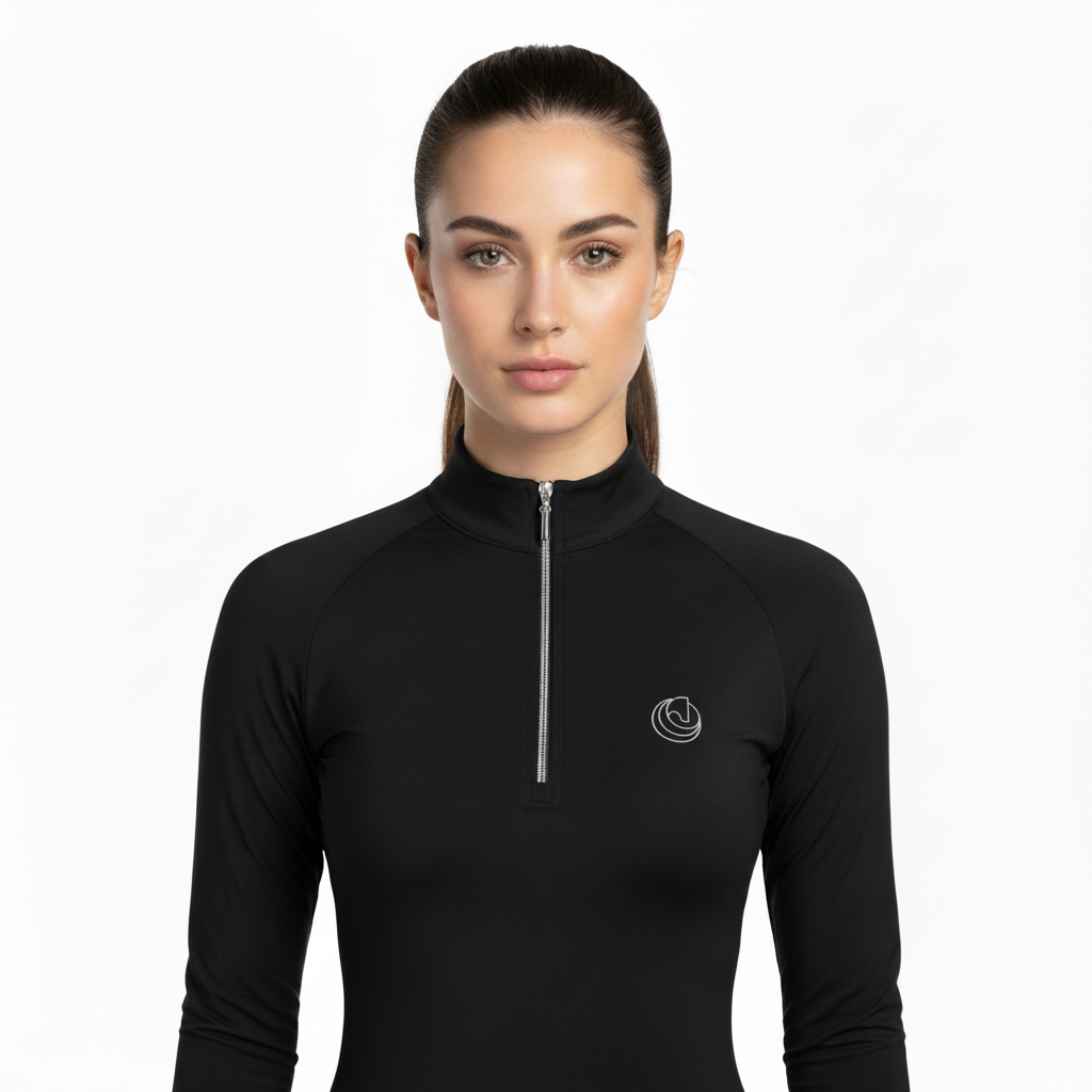 Horse Spirit Thermal Riding Layer in black - Front view on model showing the tailored feminine fit, premium combed interior, and elegant competition design.
