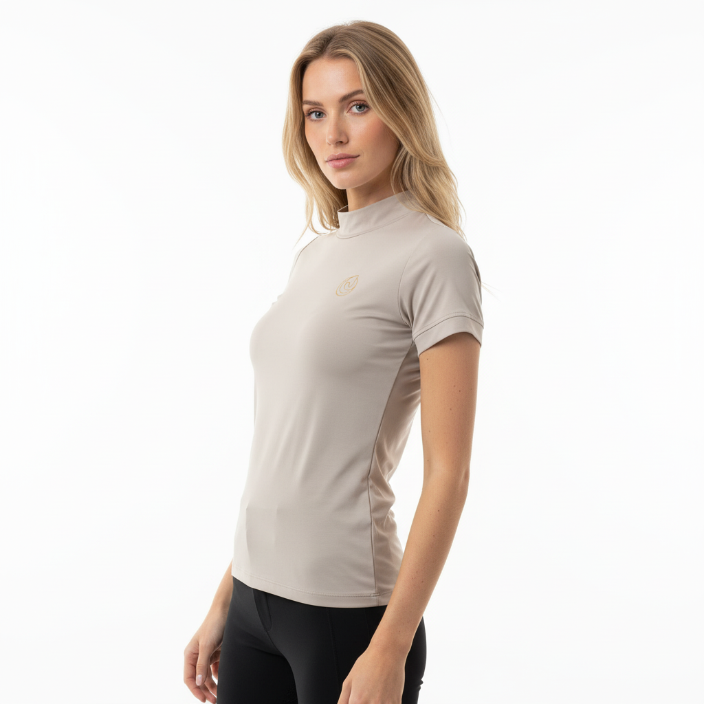 Side view of the Horse Spirit Riding Top Line Basic Beige - Shows the flattering athletic fit, breathable technical fabric, and timeless monochromatic design.