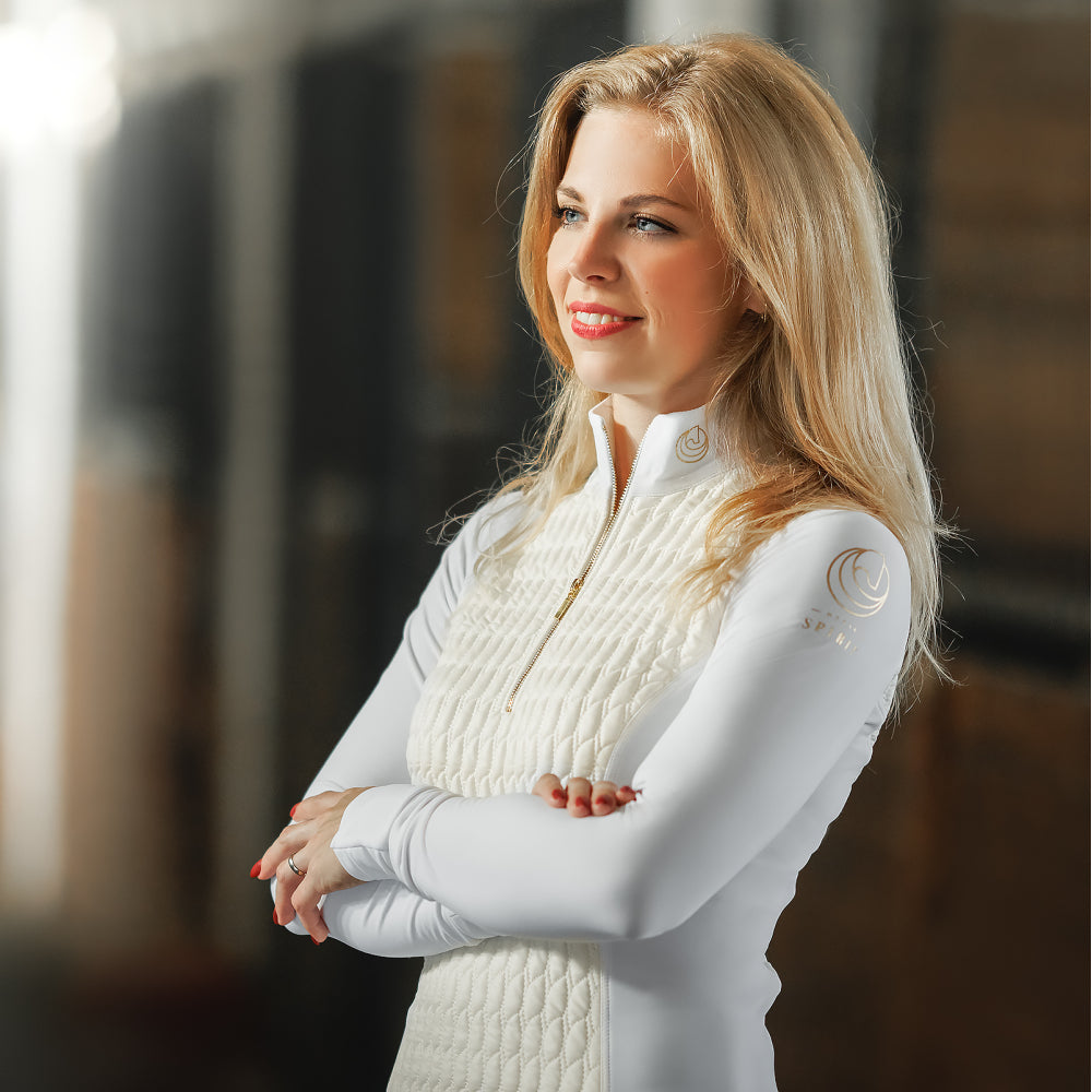 Side view of the Horse Spirit Hybrid Jacket - Shows the flattering silhouette, technical side panels, and insulated design for temperature regulation.