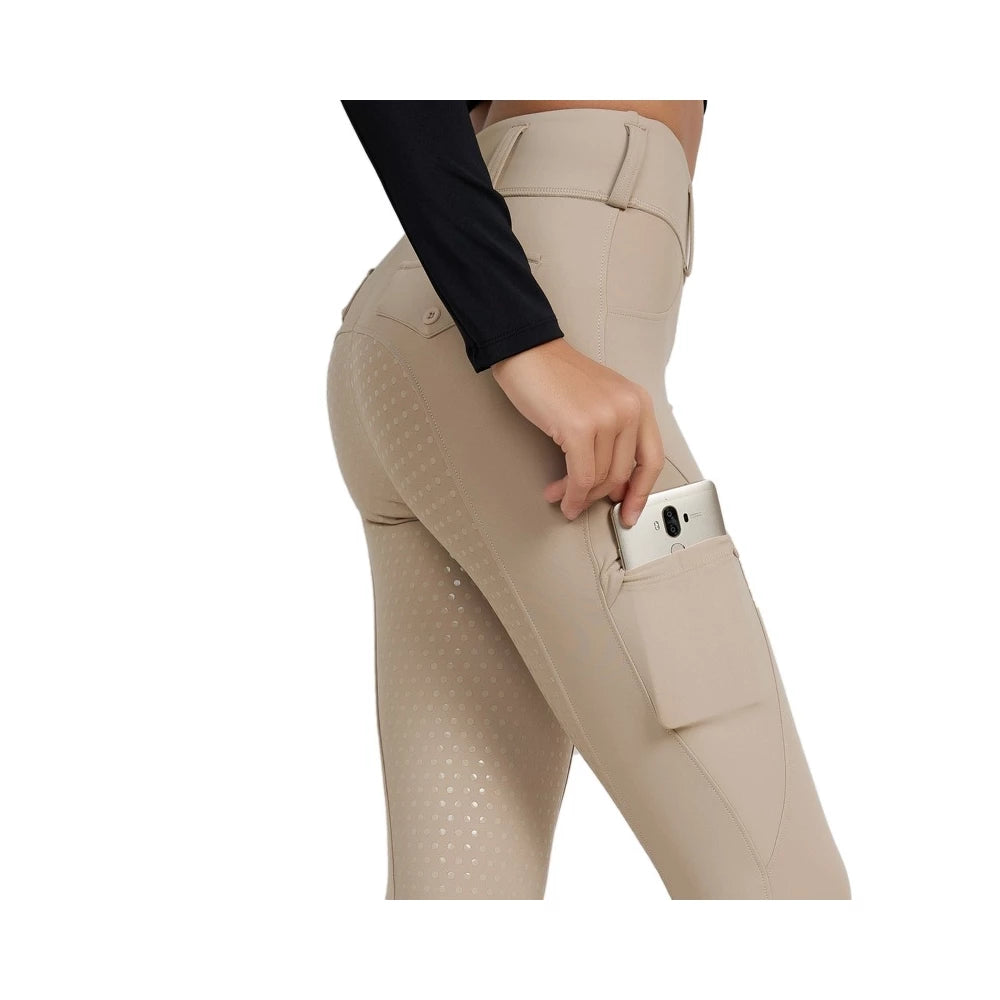 Side view of the Horse Spirit Beige Leggings - Shows the curve-enhancing silhouette, four-way stretch fabric, and sleek, shiny surface.