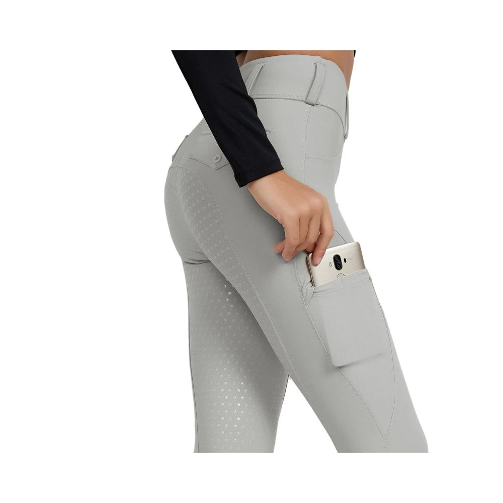 Side view of the Horse Spirit Grey Leggings - Shows the curve-enhancing silhouette, four-way stretch fabric, and sleek, shiny surface, phone pocket.